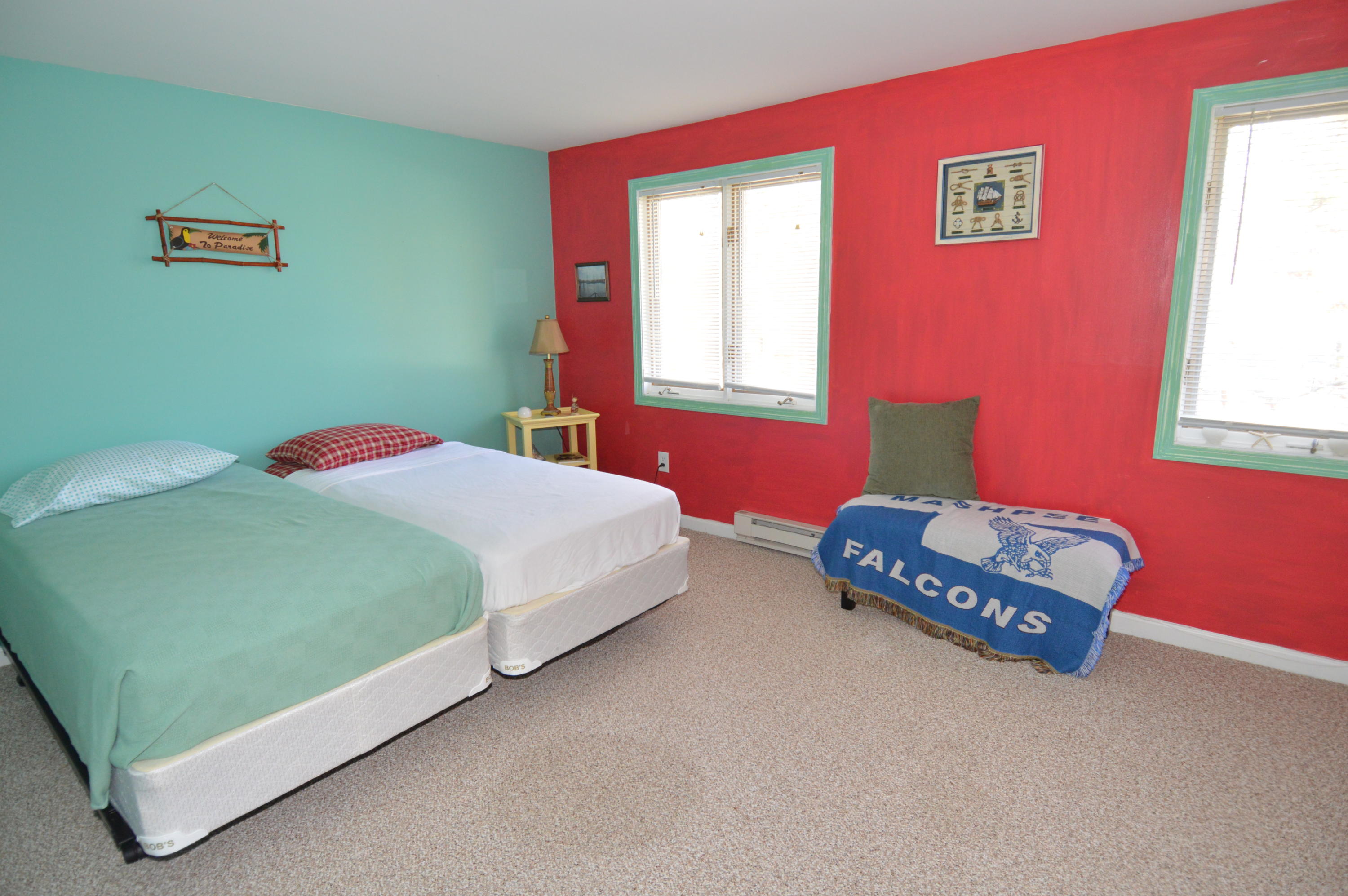 174 Lowell Road, Unit T30 Mashpee, MA 02649 - Photo 16 of 19 a bedroom with a bed and a window