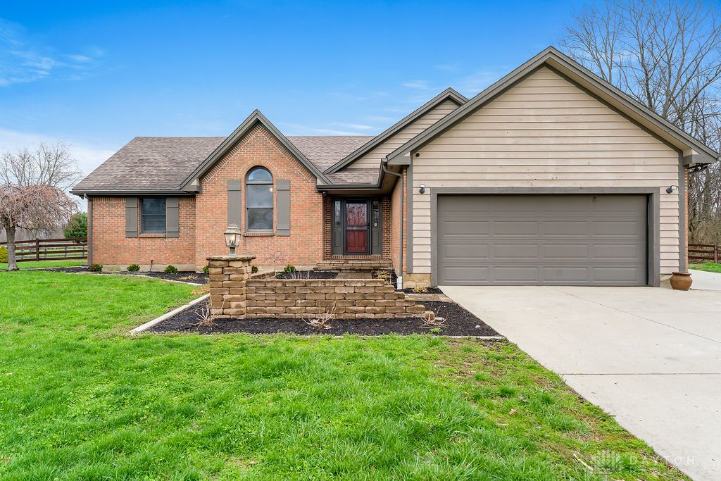 7400 Cook-Jones Road Waynesville, OH 45068 - Photo 68 of 72 This charming home offers a welcoming facade with a classic brick and siding combination.