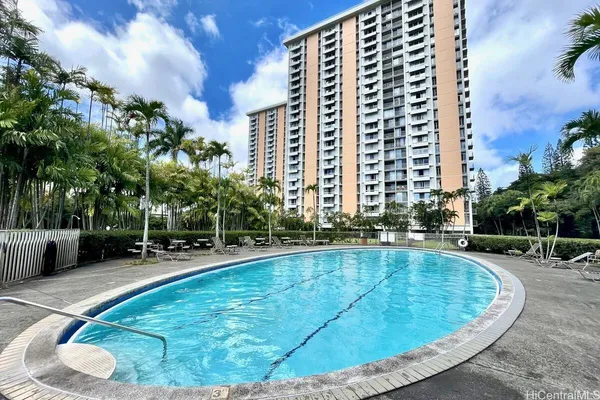a view of a swimming pool with a patio