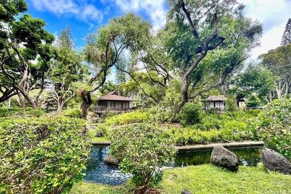 a backyard of a house with lots of green space