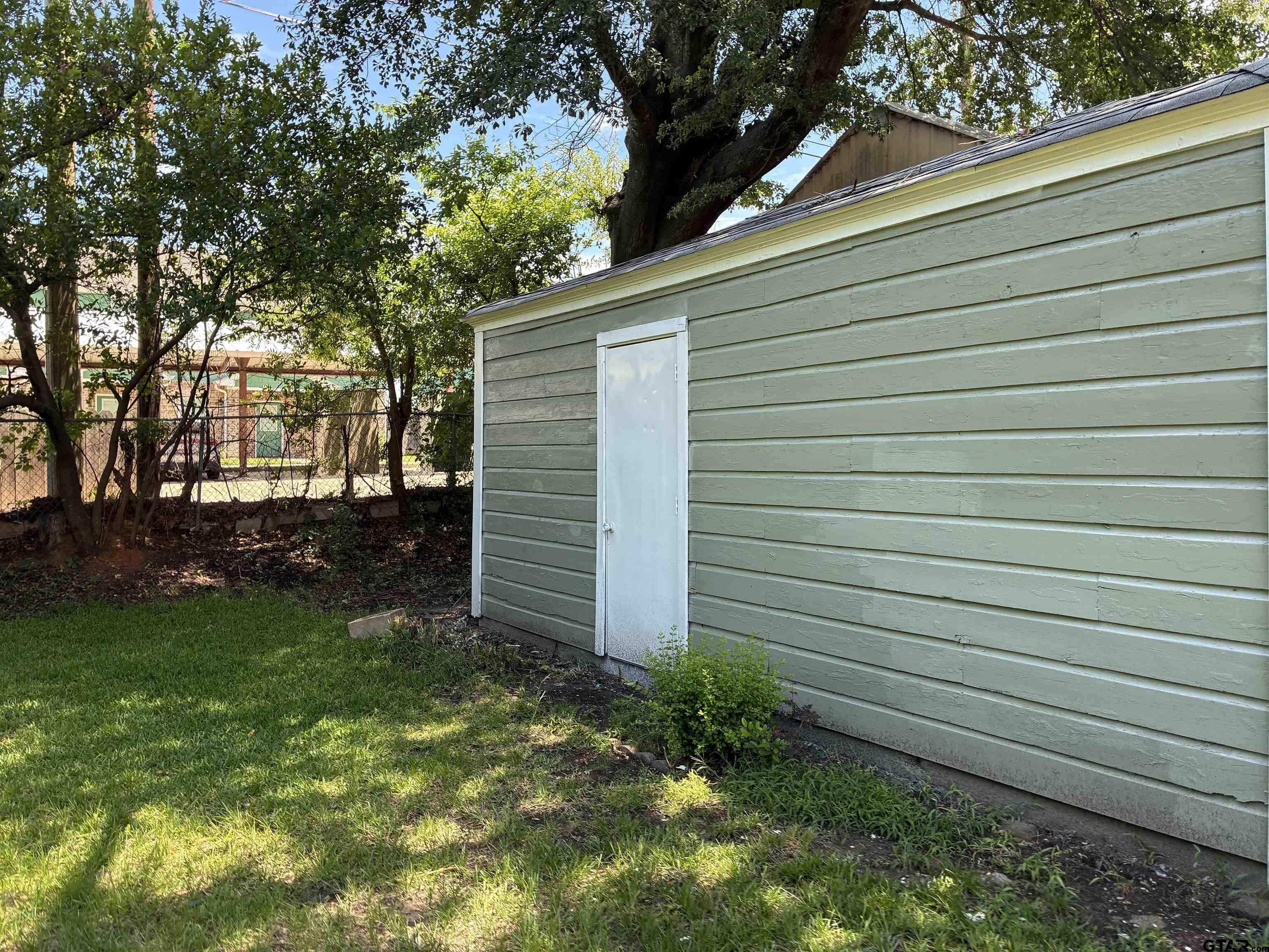 811 West 5th Street Tyler, TX 75701 - Photo 22 of 26 a view of a backyard