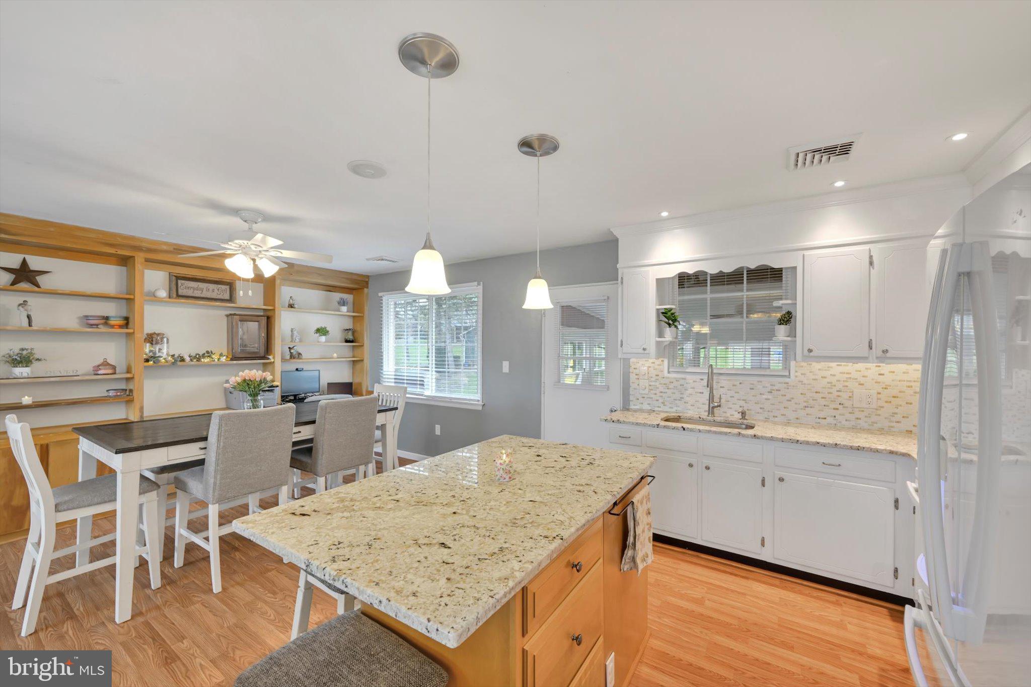 116 Swarthmore Drive Lititz, PA 17543 - Photo 12 of 34 a large kitchen with a table and chairs
