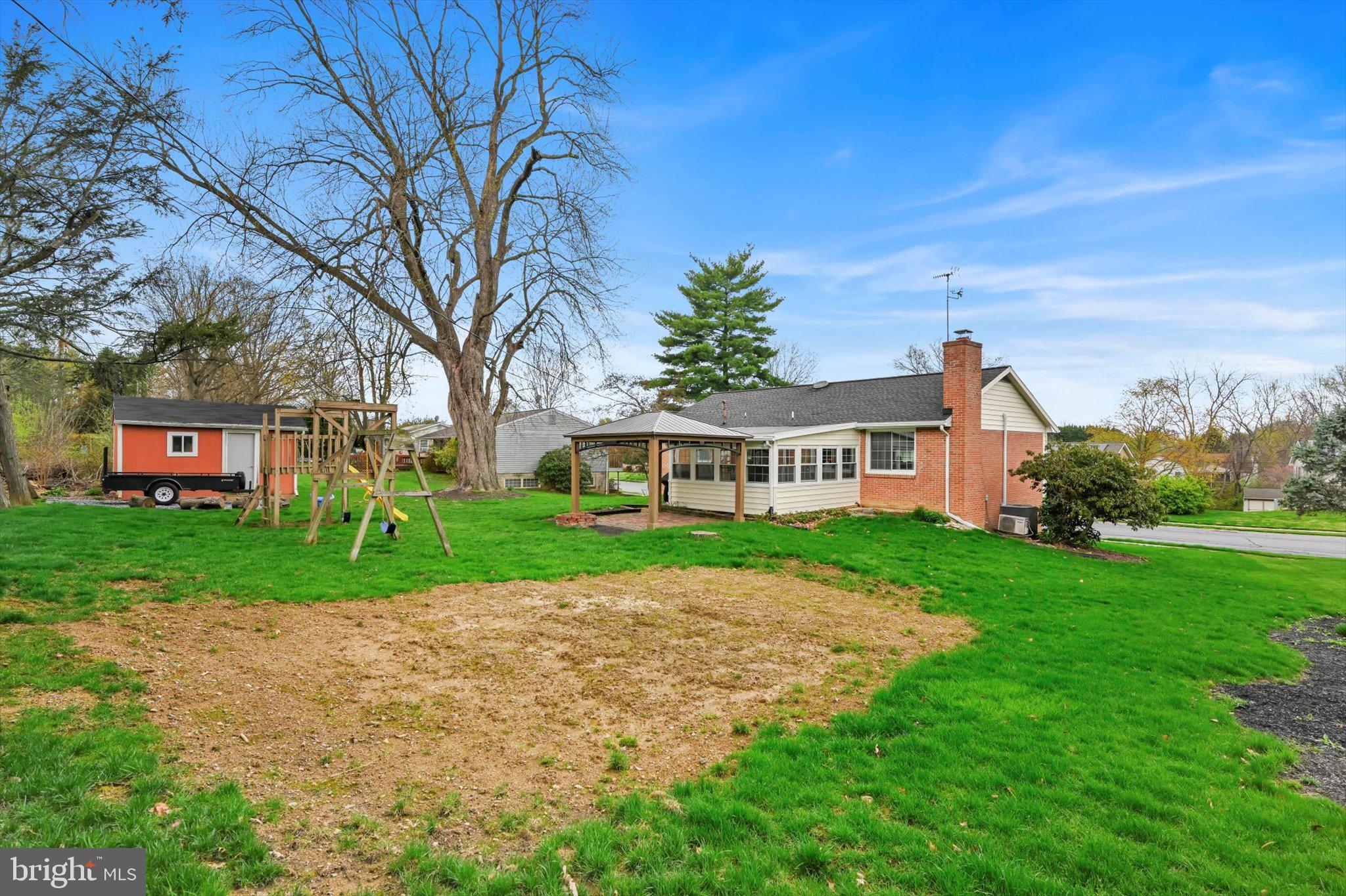 116 Swarthmore Drive Lititz, PA 17543 - Photo 33 of 34 a view of house in front of a big yard with large trees
