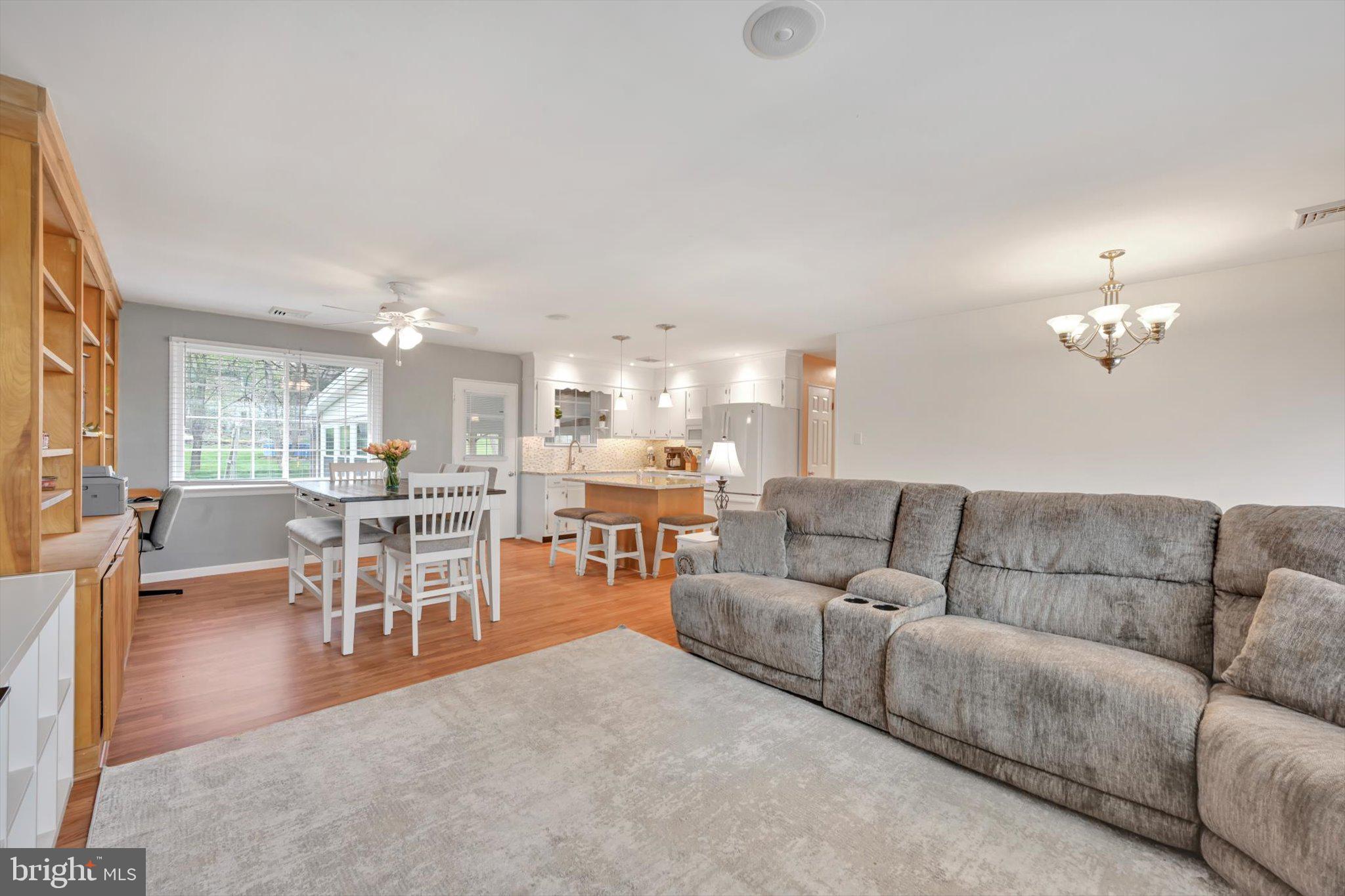 116 Swarthmore Drive Lititz, PA 17543 - Photo 8 of 34 a living room with furniture kitchen view and a dining table