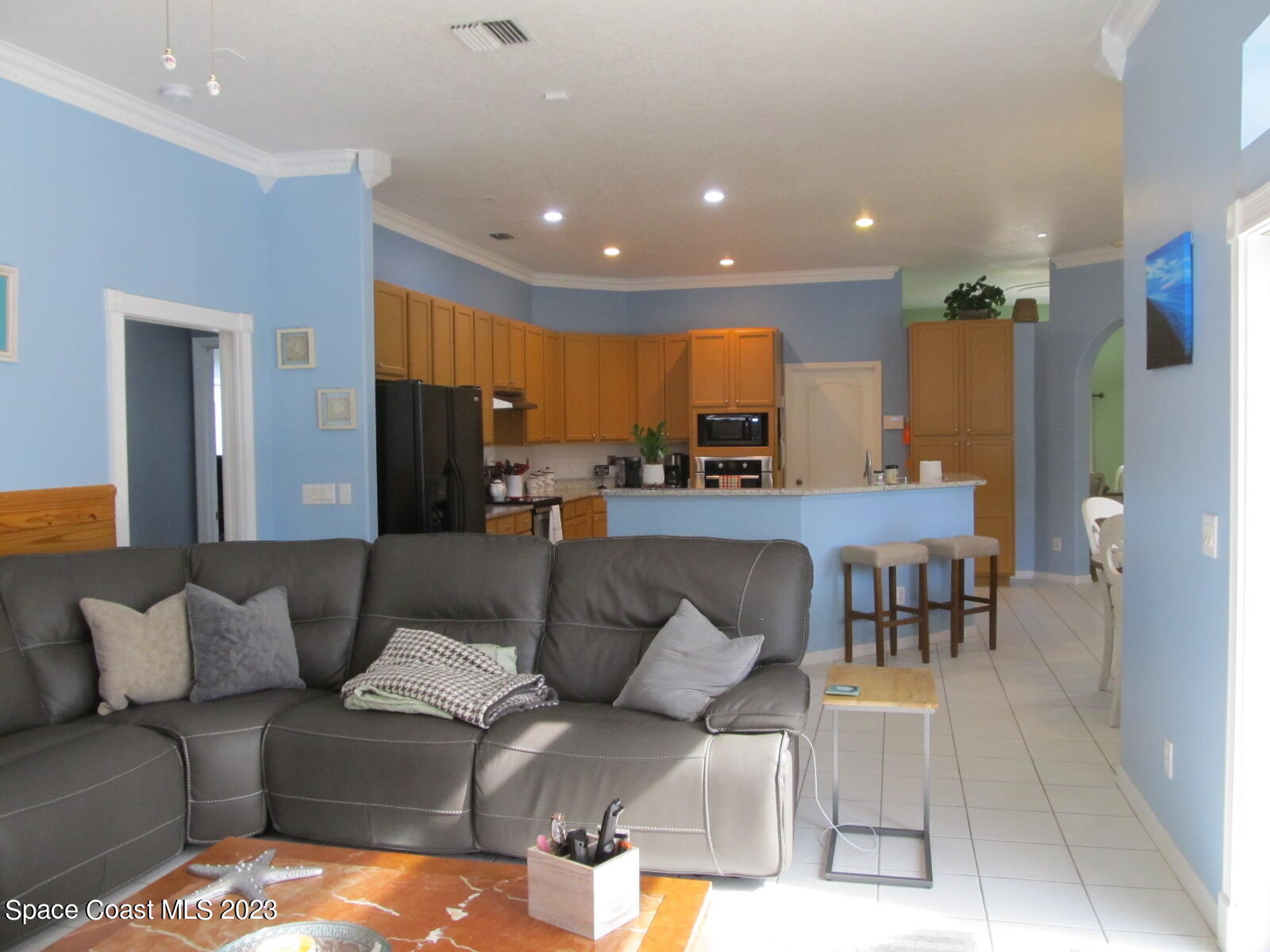 600 Roth Court Southeast Palm Bay, FL 32909 - Photo 8 of 53 Family Room View to Kitchen