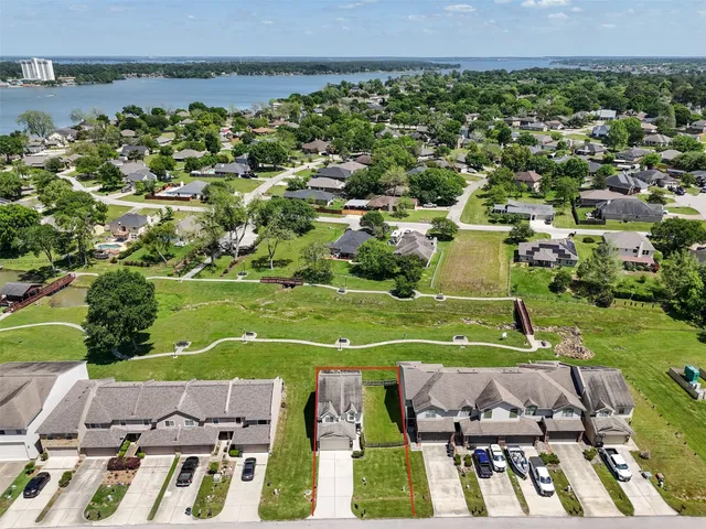 a view of yard with table and chairs