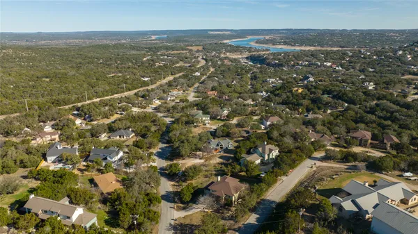 an aerial view of residential building and ocean