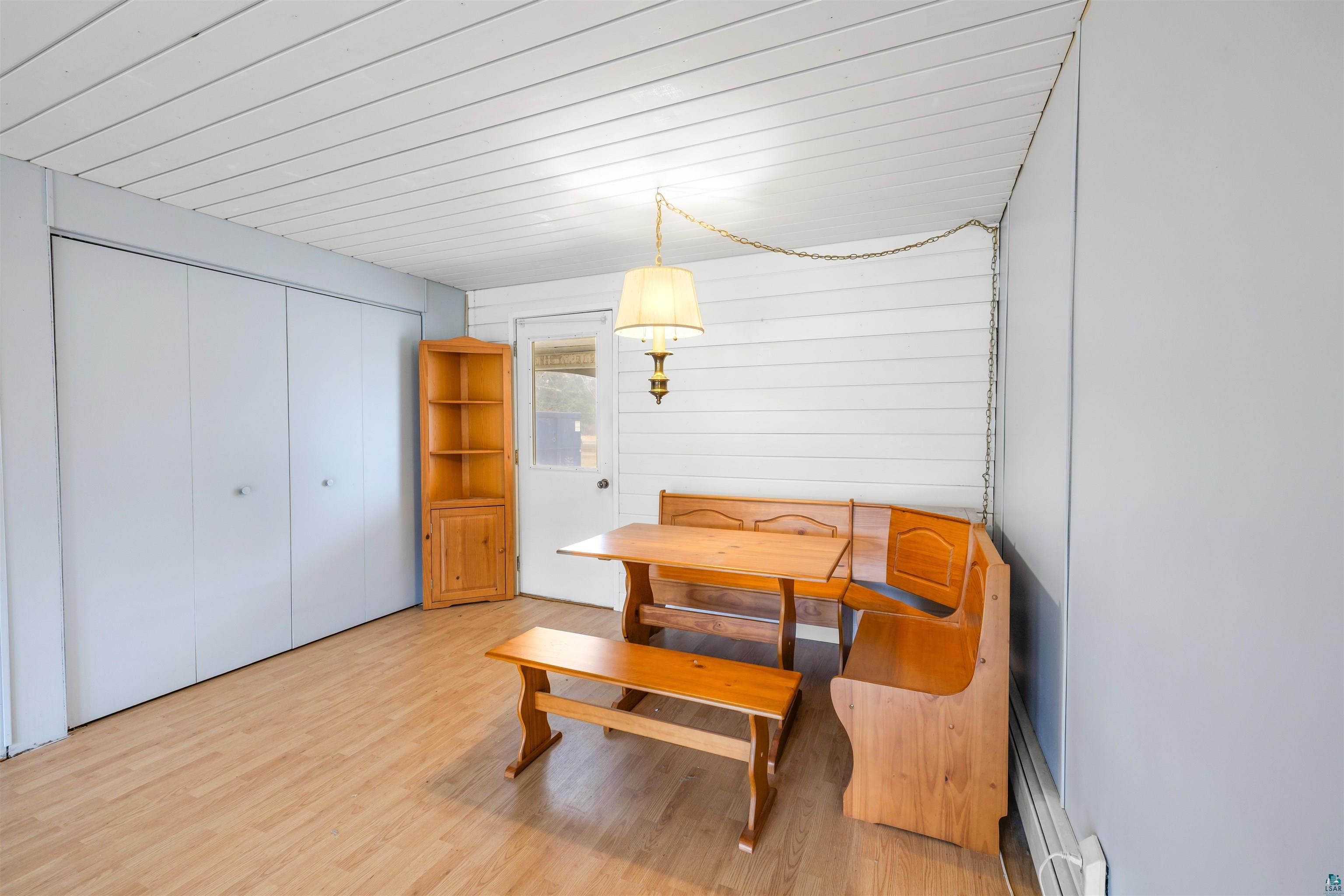 11574 Town Line Road Hibbing, MN 55746 - Photo 9 of 41 Wood-finish flooring with a white paneled ceiling