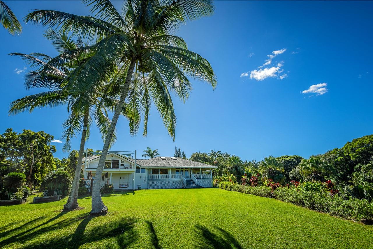 555 North Holokai Road Haiku, HI 96708 - Photo 47 of 50 While meandering around the large lawn area & appreciating the tropical foliage
