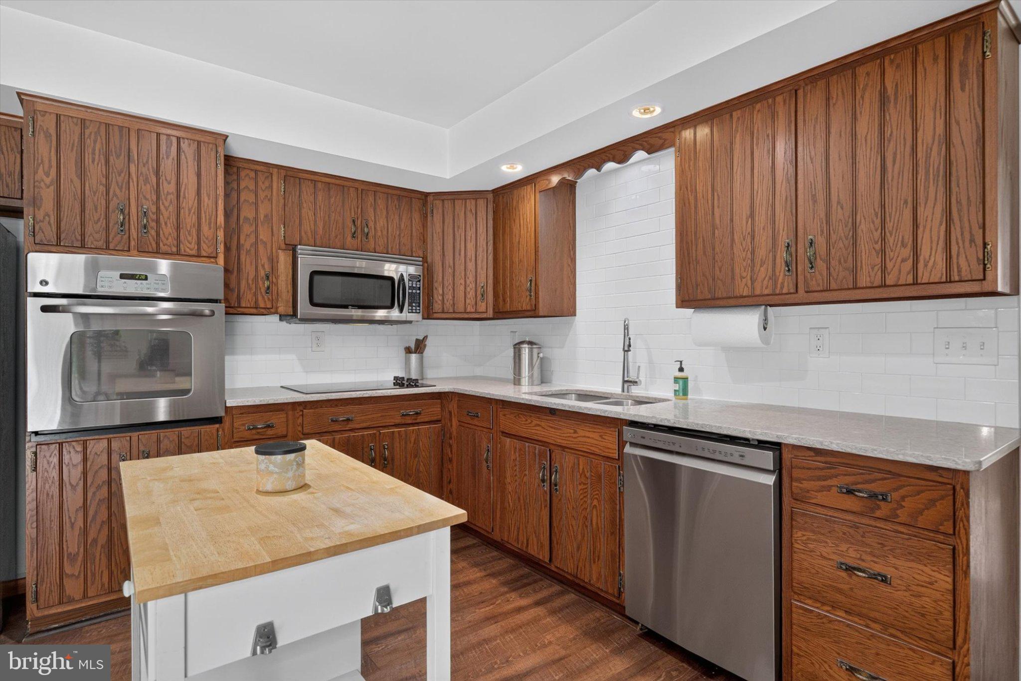 1147 Pinetown Road Lewisberry, PA 17339 - Photo 25 of 55 Warm wood tones in a modern kitchen.