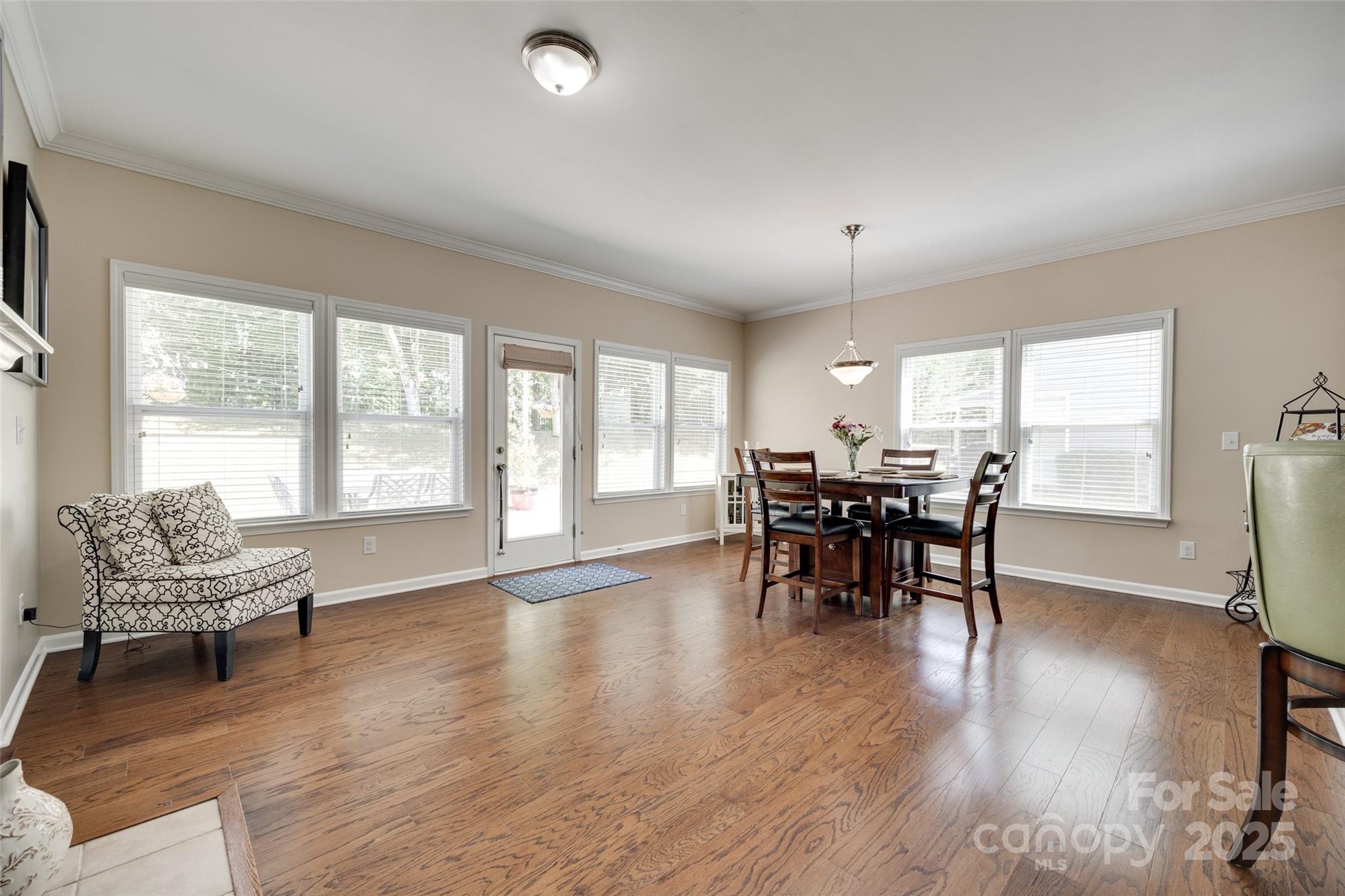 985 Angelica Lane Tega Cay, SC 29708 - Photo 11 of 47 a living room with furniture and wooden floor