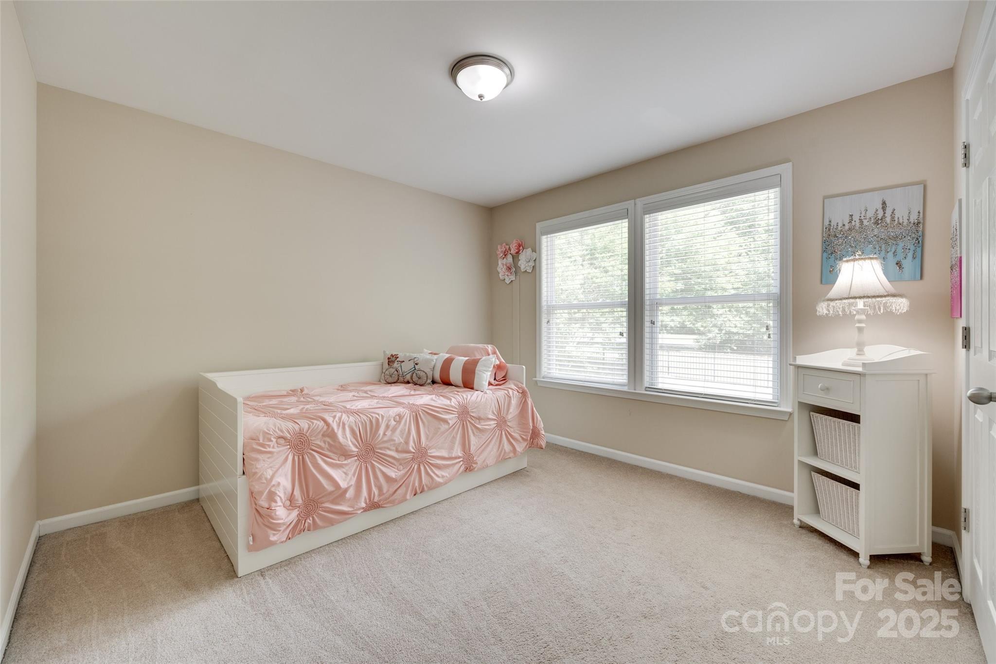 985 Angelica Lane Tega Cay, SC 29708 - Photo 25 of 47 a bed room with a bed and a window
