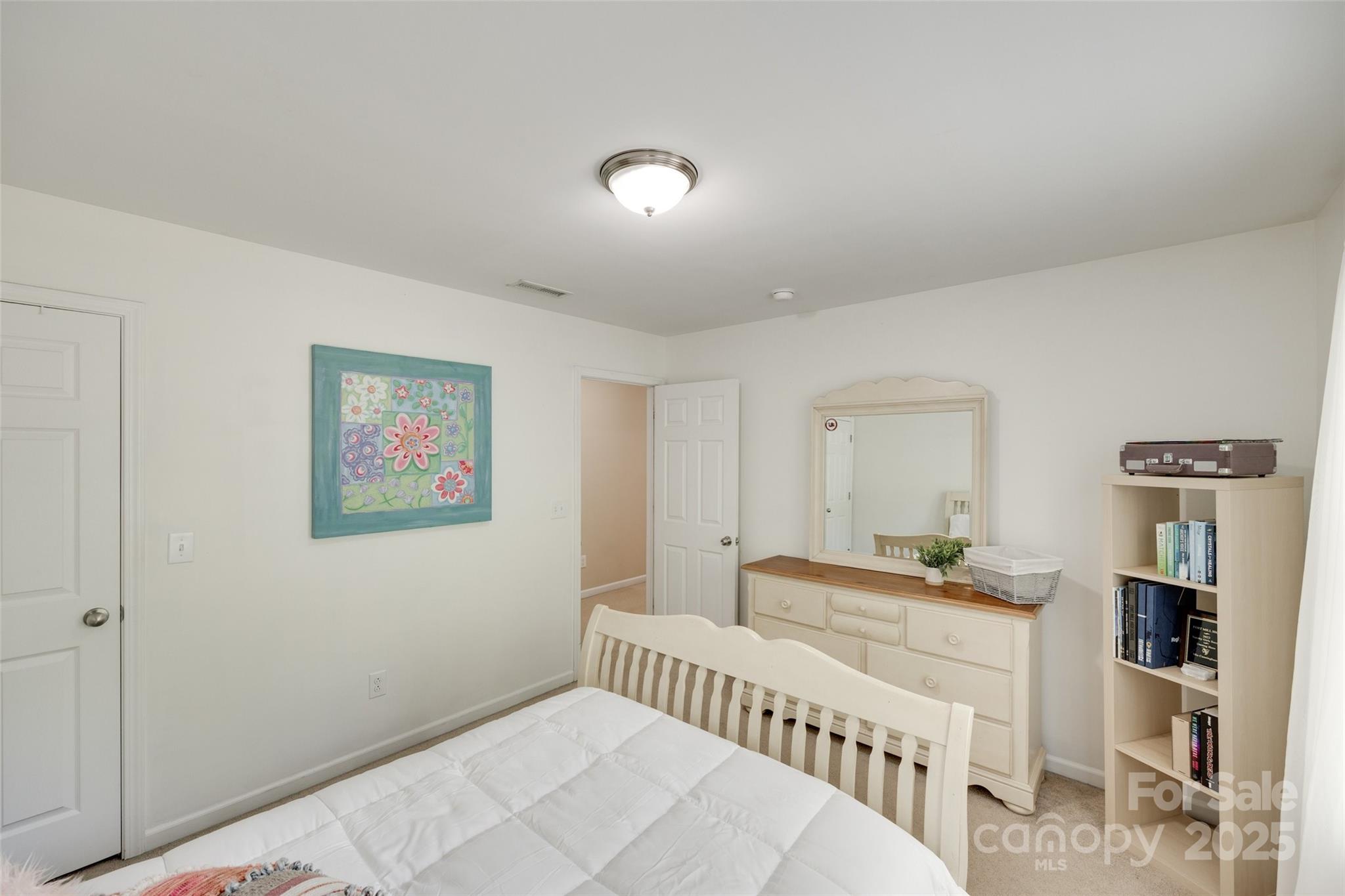 985 Angelica Lane Tega Cay, SC 29708 - Photo 28 of 47 a bedroom with furniture and baby crib