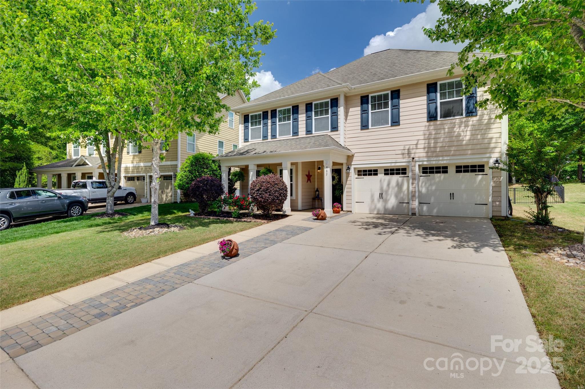 985 Angelica Lane Tega Cay, SC 29708 - Photo 37 of 47 a front view of a house with a yard
