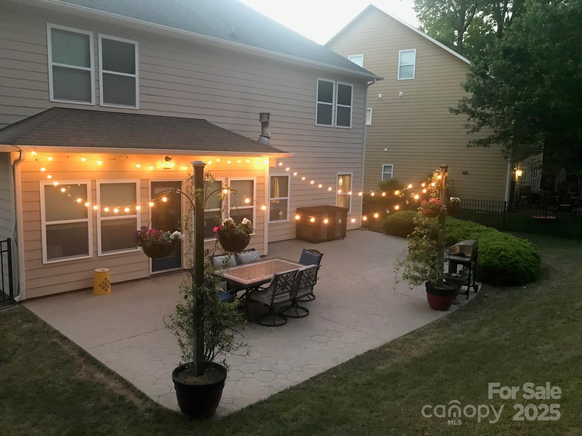 985 Angelica Lane Tega Cay, SC 29708 - Photo 39 of 47 a building outdoor space with patio furniture and potted plants