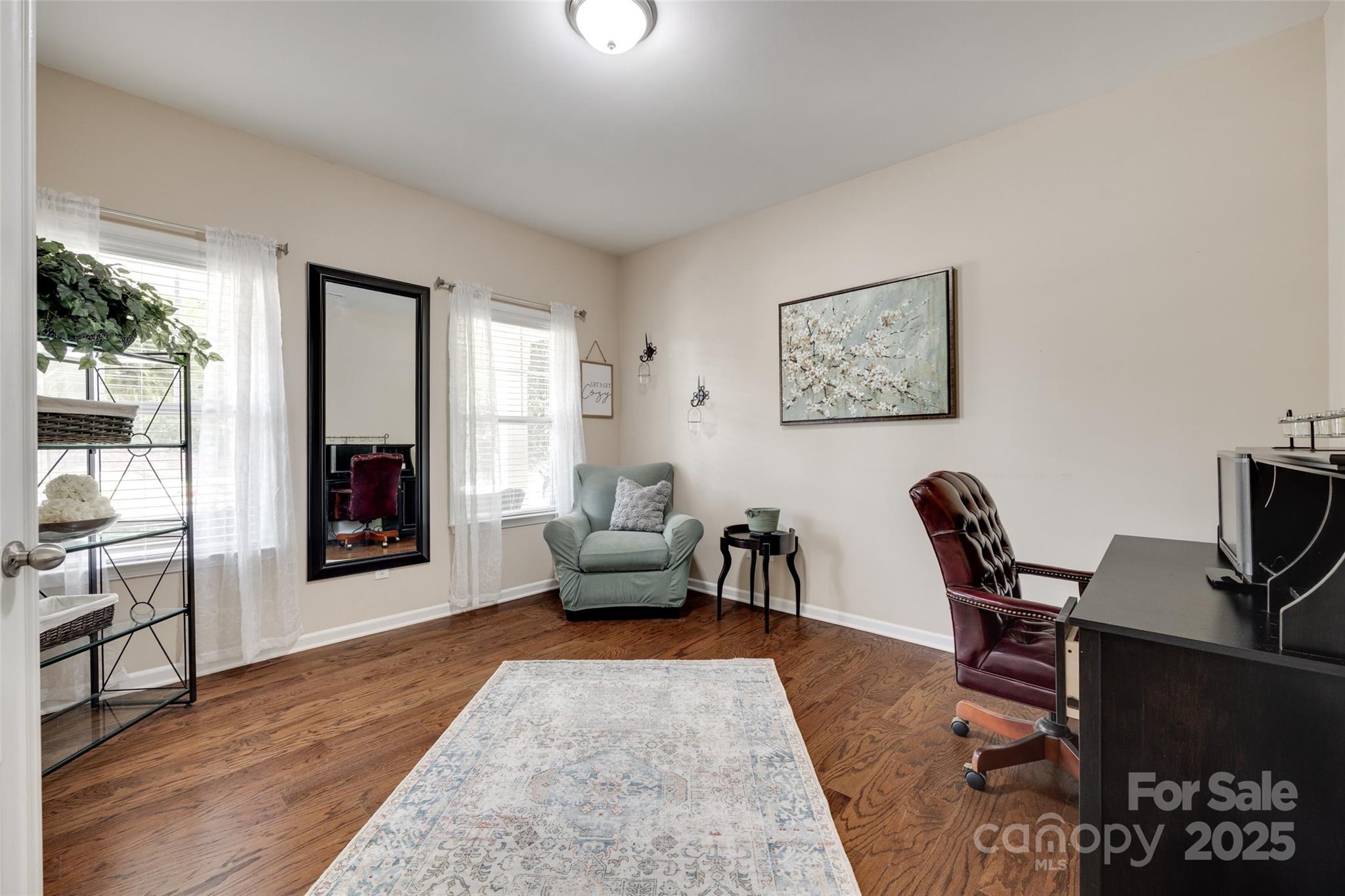 985 Angelica Lane Tega Cay, SC 29708 - Photo 4 of 47 a view of a workspace with furniture and a window