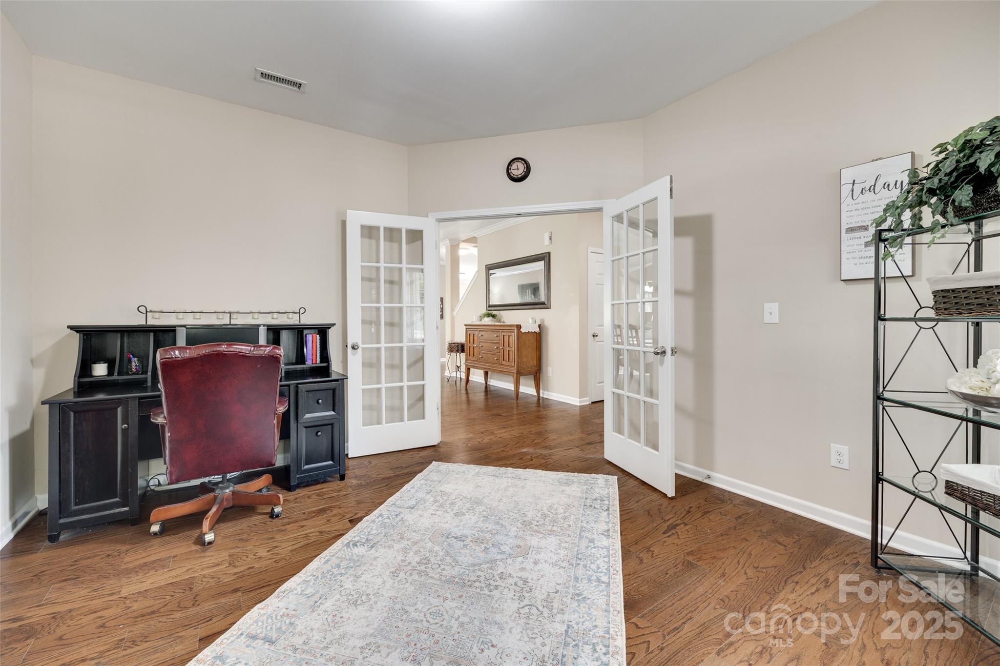 985 Angelica Lane Tega Cay, SC 29708 - Photo 5 of 47 a view of a livingroom with furniture and a workspace
