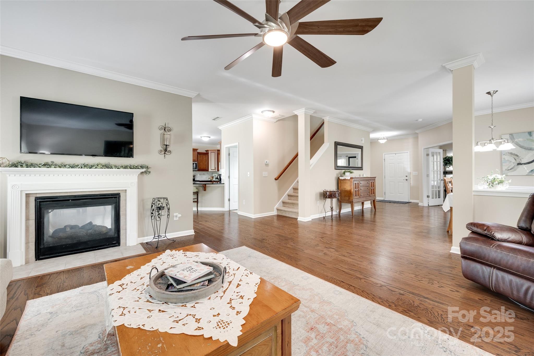 985 Angelica Lane Tega Cay, SC 29708 - Photo 10 of 47 a living room with furniture and a fireplace