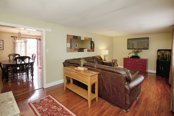 486 Cotuit Road Mashpee, MA 02649 - Photo 3 of 29 a bed room with a bed and a television