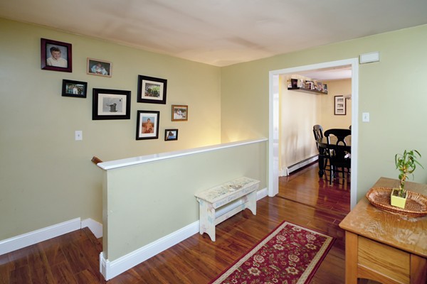 486 Cotuit Road Mashpee, MA 02649 - Photo 7 of 29 a view of a livingroom with furniture and wooden floor