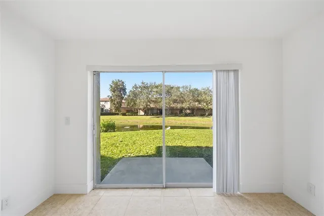 a view of a room that has a bed