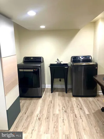 a bed room with a bed and a television