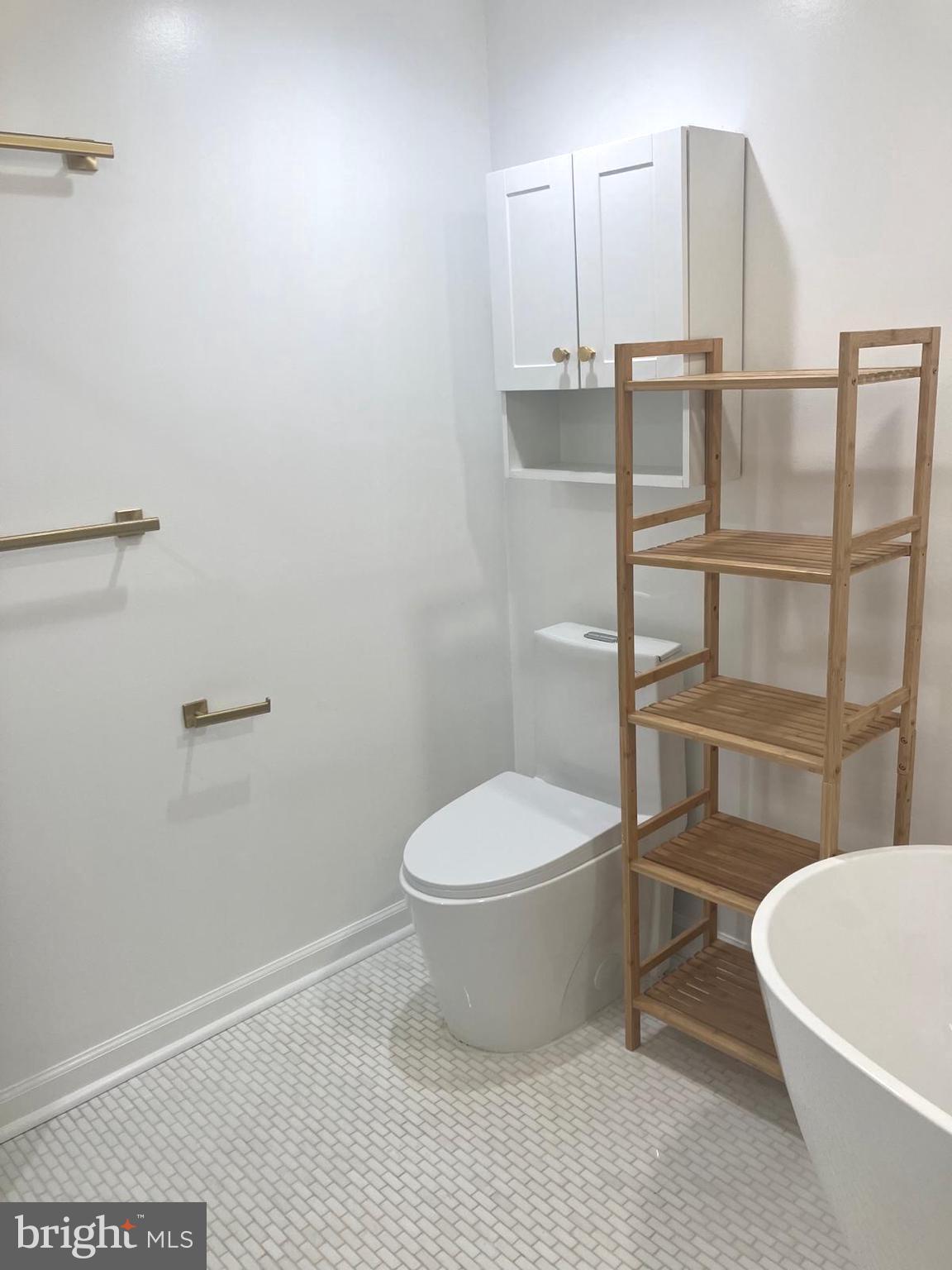 626 South Irving Street Arlington, VA 22204 - Photo 20 of 28 a bathroom with a toilet and a shower