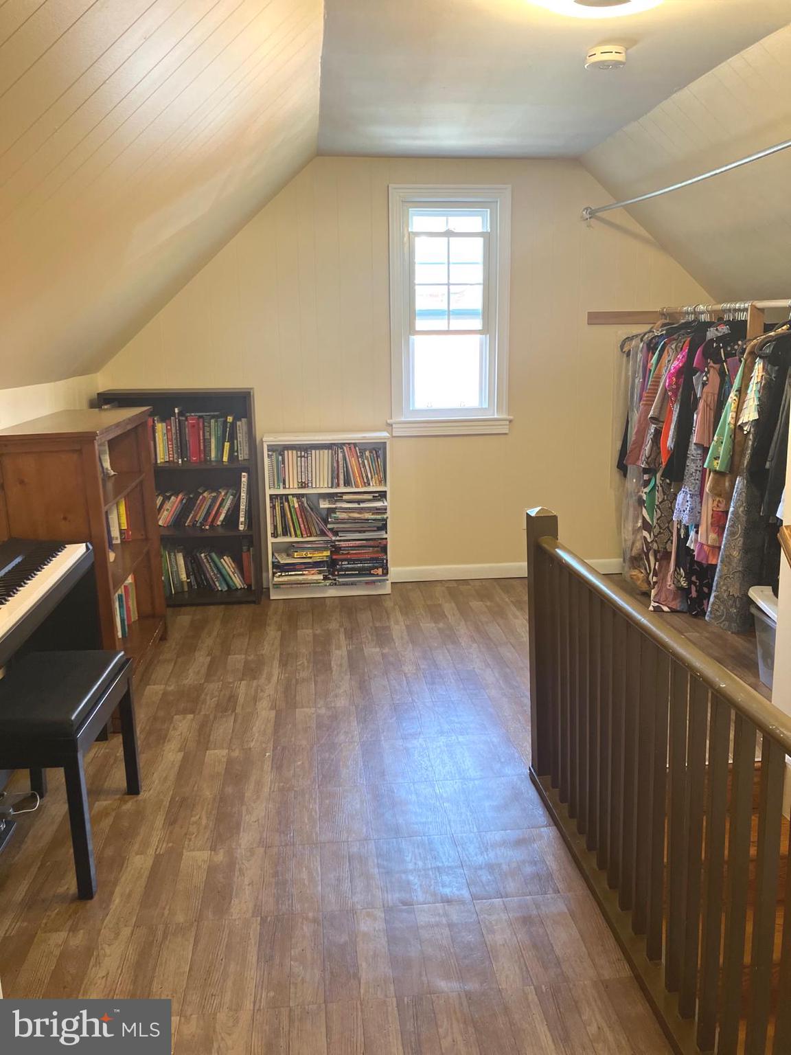 626 South Irving Street Arlington, VA 22204 - Photo 23 of 28 a view of a hallway with wooden floor and stairs
