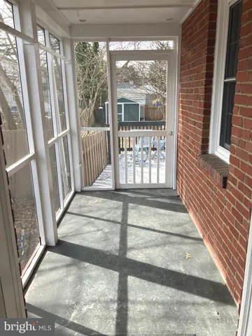 a view of staircase with large window