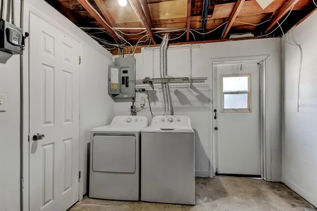a utility room with dryer and washer