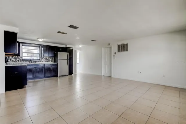 a view of a kitchen with a sink