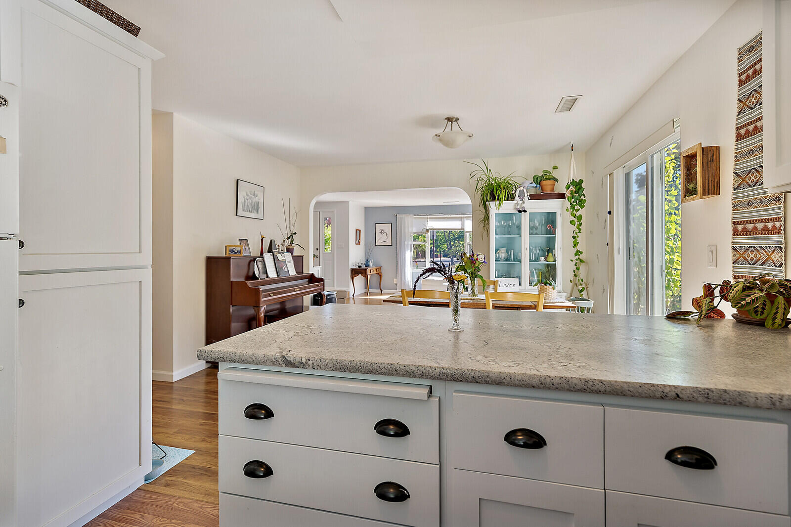 1399 Mill Pond Road Ashland, OR 97520 - Photo 13 of 28 a view living room with granite countertop furniture and wooden floor