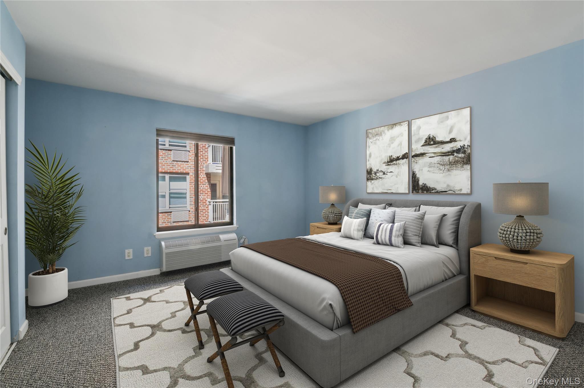 425 Shore Road, Unit 2B Long Beach, NY 11561 - Photo 11 of 23 a bedroom with a bed and a window