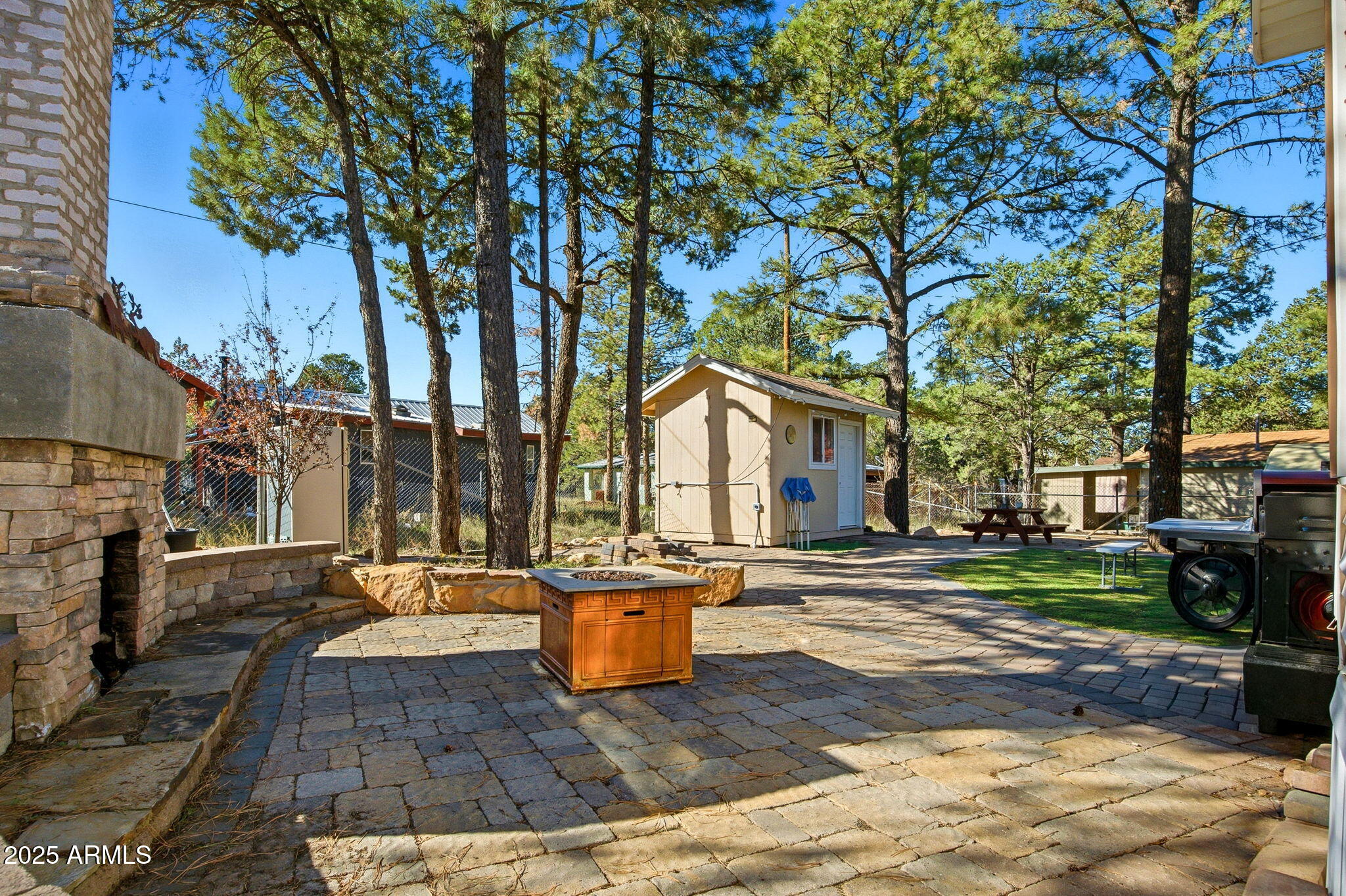 2169 Tenderfoot Trail Overgaard, AZ 85933 - Photo 17 of 30 a front view of a house with a yard