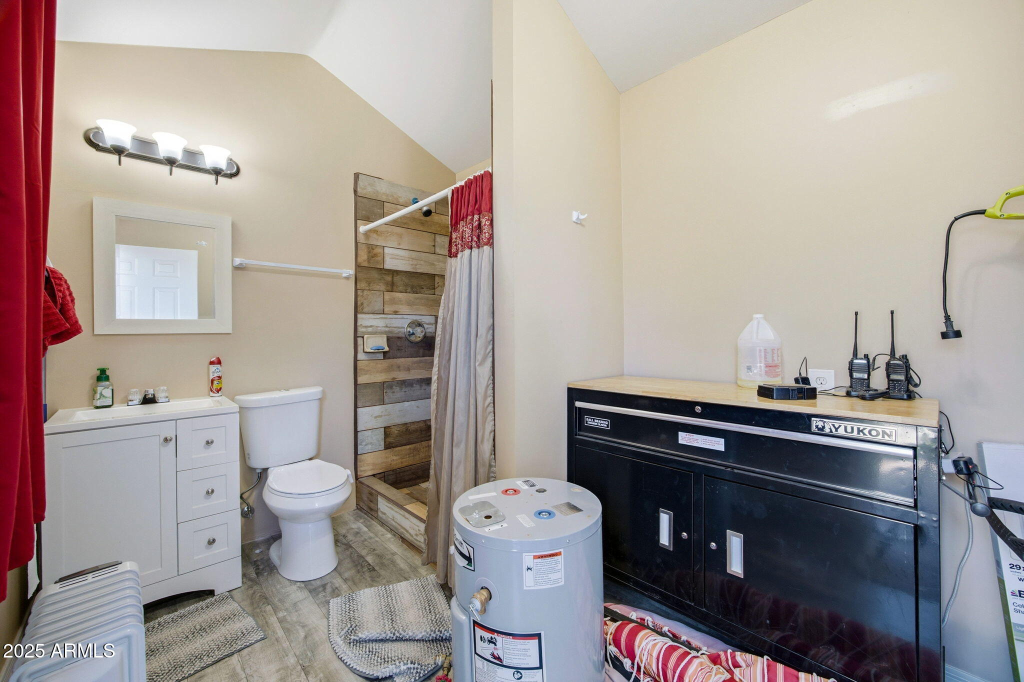 2169 Tenderfoot Trail Overgaard, AZ 85933 - Photo 21 of 30 a bathroom with a sink toilet vanity and tub