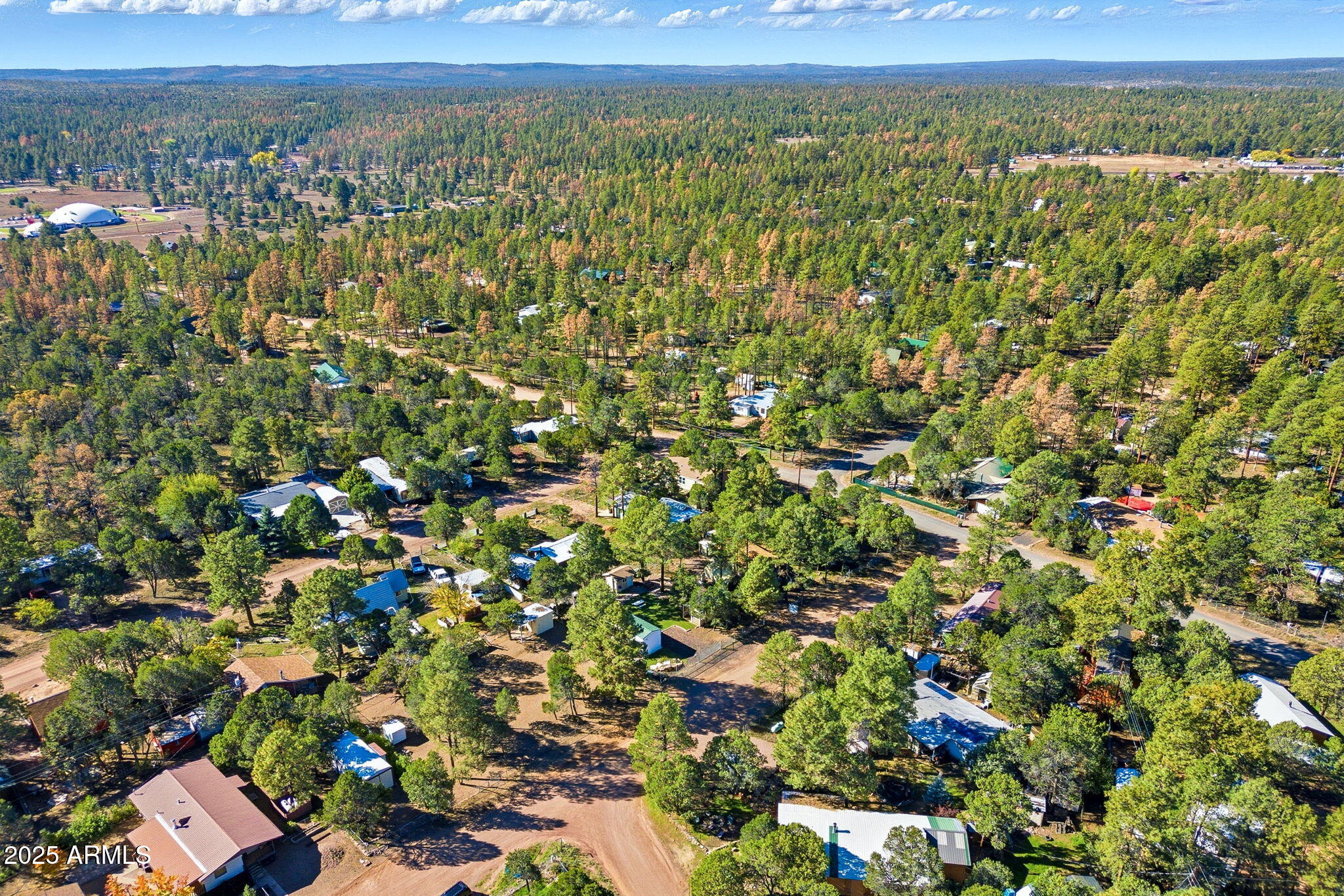 2169 Tenderfoot Trail Overgaard, AZ 85933 - Photo 26 of 30 a view of a city with lush green forest