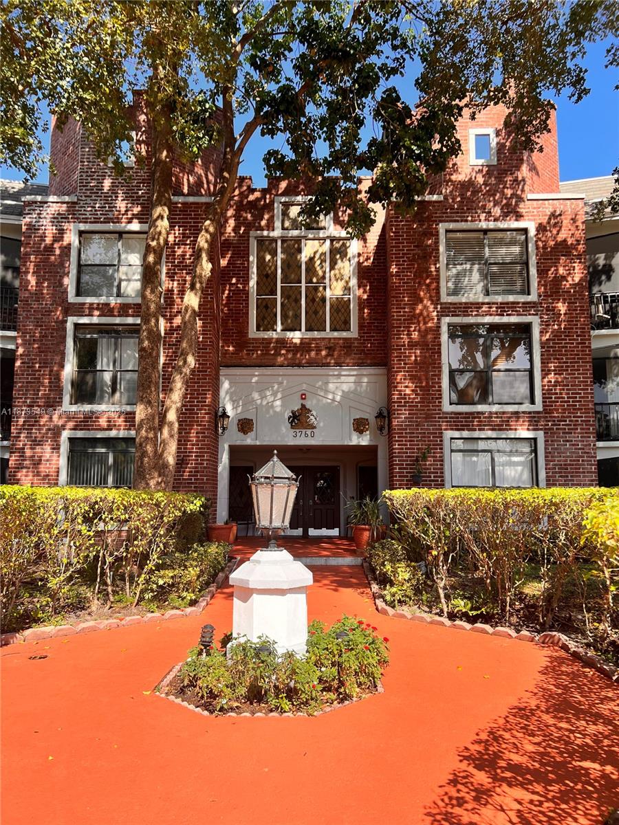 3760 Inverrary Drive, Unit 2Z Lauderhill, FL 33319 - Photo 1 of 34 a front view of a house with a yard