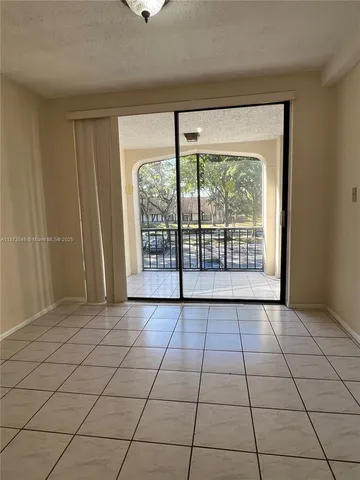 a view of a room with a large window