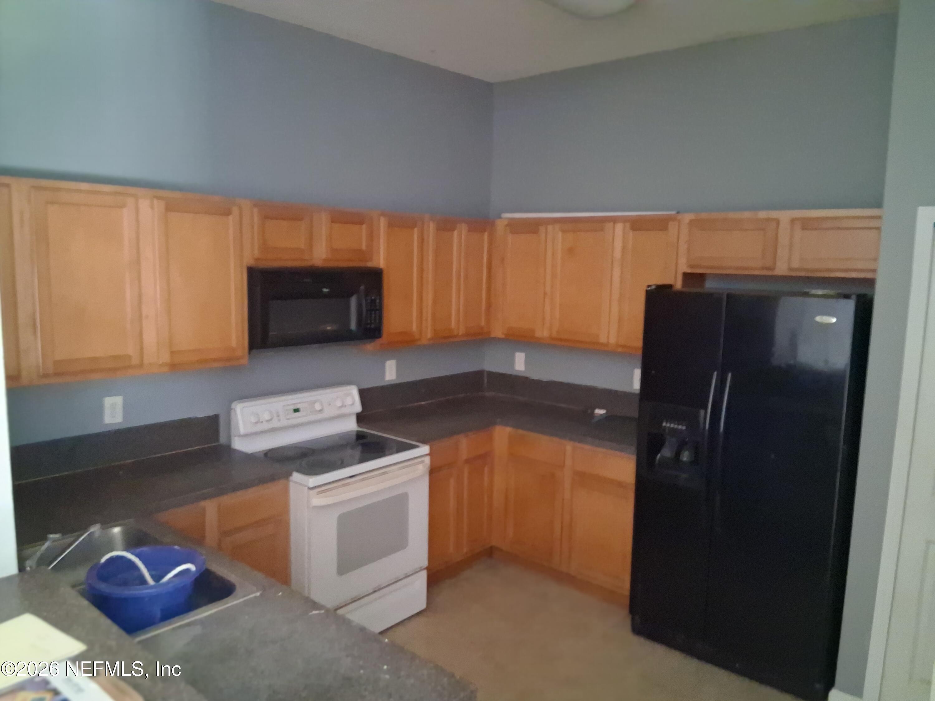 7920 Merrill Road, Unit 1302 Jacksonville, FL 32277 - Photo 3 of 11 Kitchen