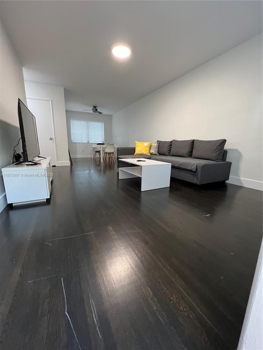 620 Jefferson Avenue, Unit 2 Miami Beach, FL 33139 - Photo 3 of 24 a living room with furniture and a flat screen tv