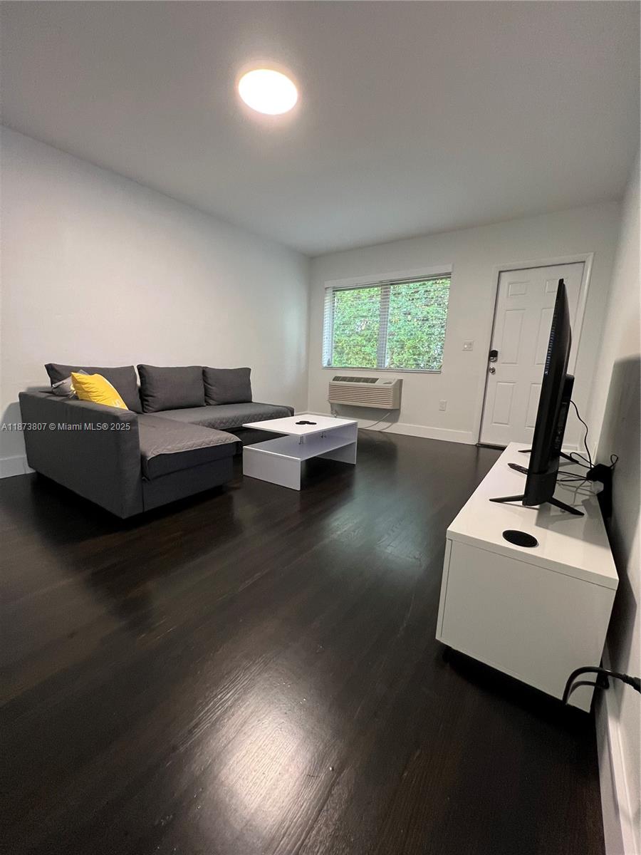 620 Jefferson Avenue, Unit 2 Miami Beach, FL 33139 - Photo 4 of 24 a living room with furniture and a window
