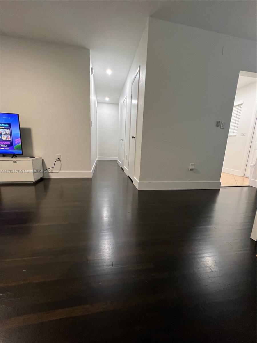 620 Jefferson Avenue, Unit 2 Miami Beach, FL 33139 - Photo 7 of 24 a view of empty room with wooden floor