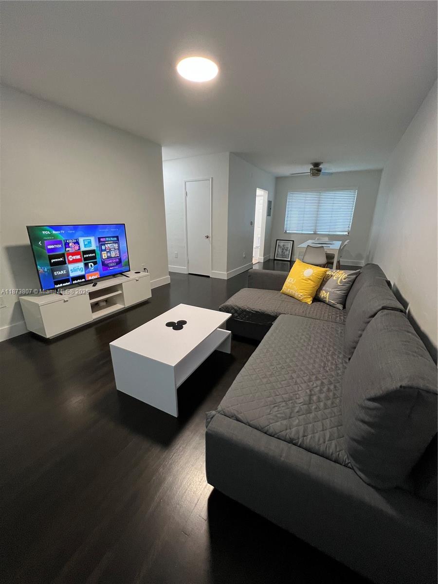 620 Jefferson Avenue, Unit 2 Miami Beach, FL 33139 - Photo 8 of 24 a living room with furniture and a wooden floor