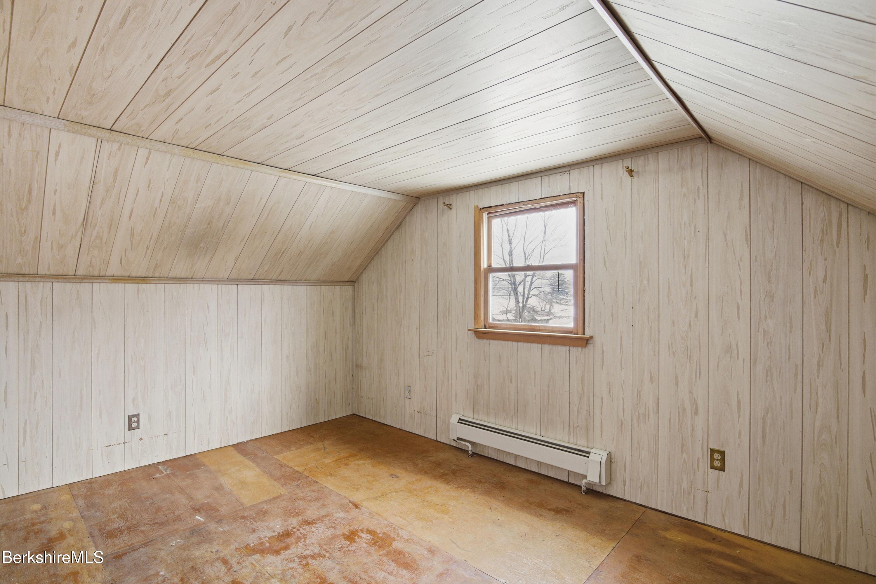 11 Opeechee Street Lanesborough, MA 01237 - Photo 22 of 35 an empty room with windows