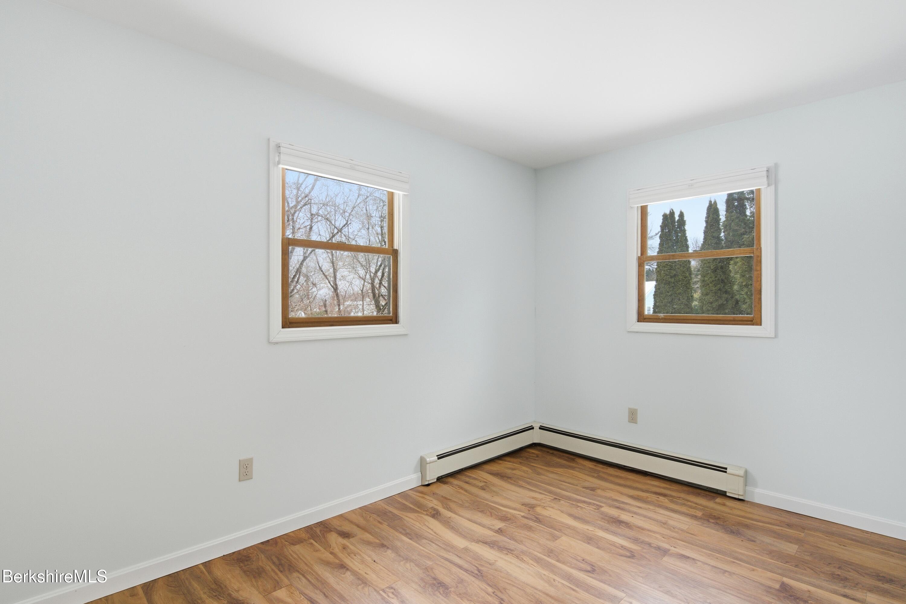 11 Opeechee Street Lanesborough, MA 01237 - Photo 33 of 35 a view of empty room with wooden floor