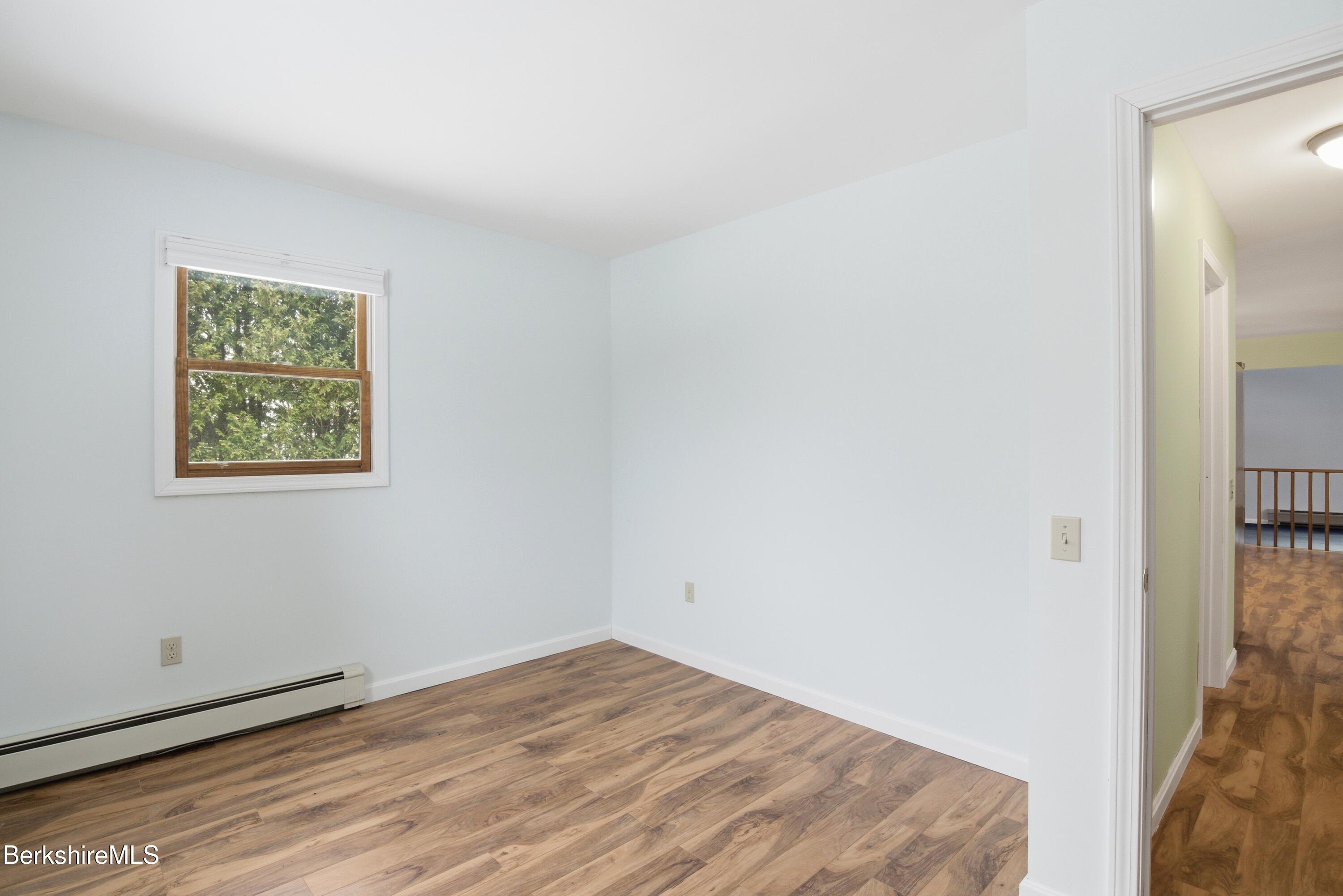 11 Opeechee Street Lanesborough, MA 01237 - Photo 35 of 35 a view of empty room with wooden floor