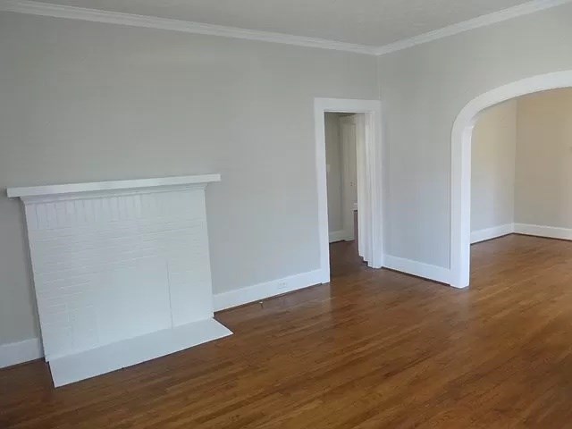 1344 Rhodes Street Columbus, GA 31901 - Photo 3 of 10 a view of an empty room with wooden floor