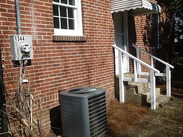 1344 Rhodes Street Columbus, GA 31901 - Photo 10 of 10 a front view of a house with street