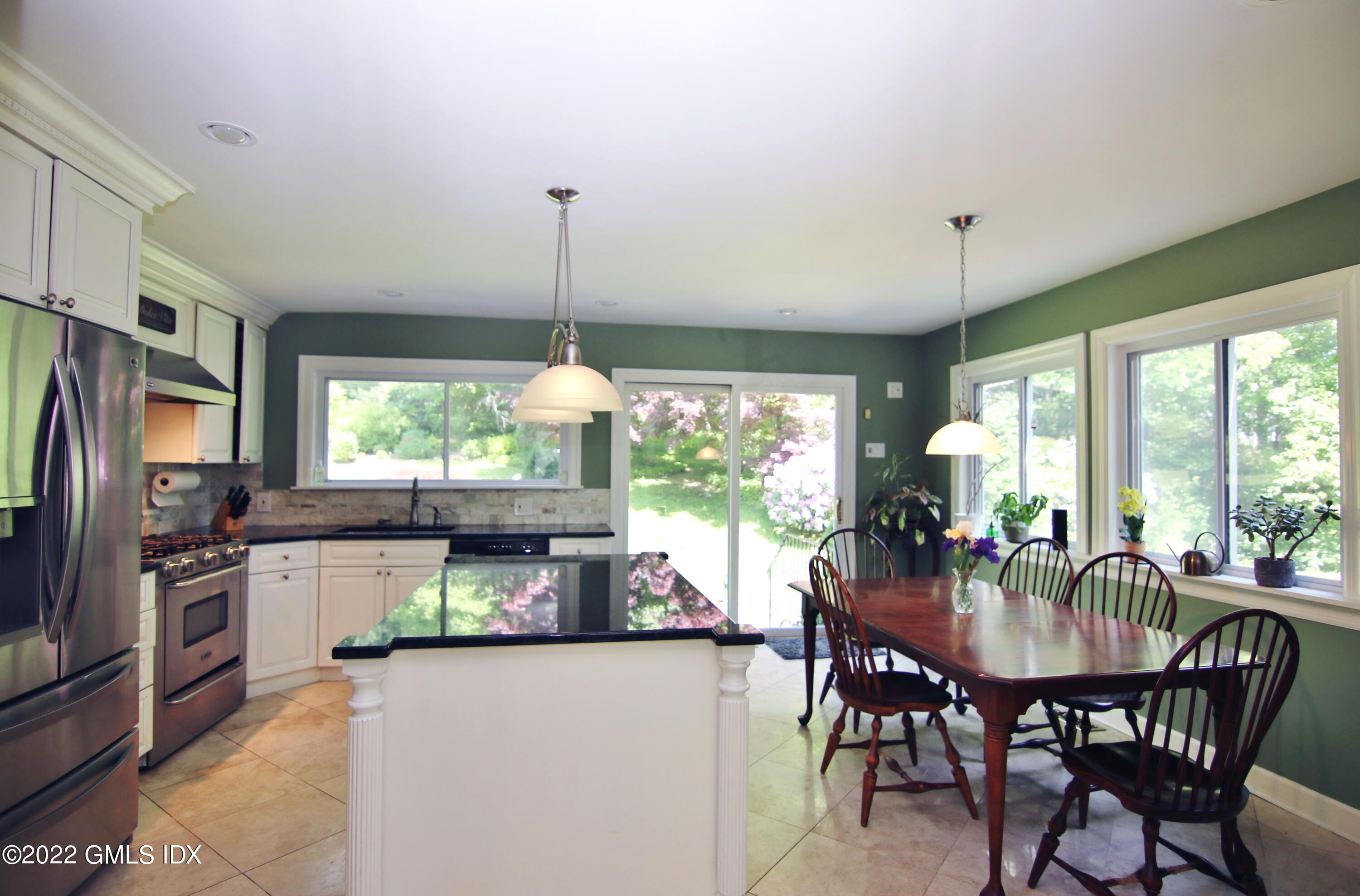 929 Riverbank Road Stamford, CT 06903 - Photo 15 of 42 Sunny casual dining area