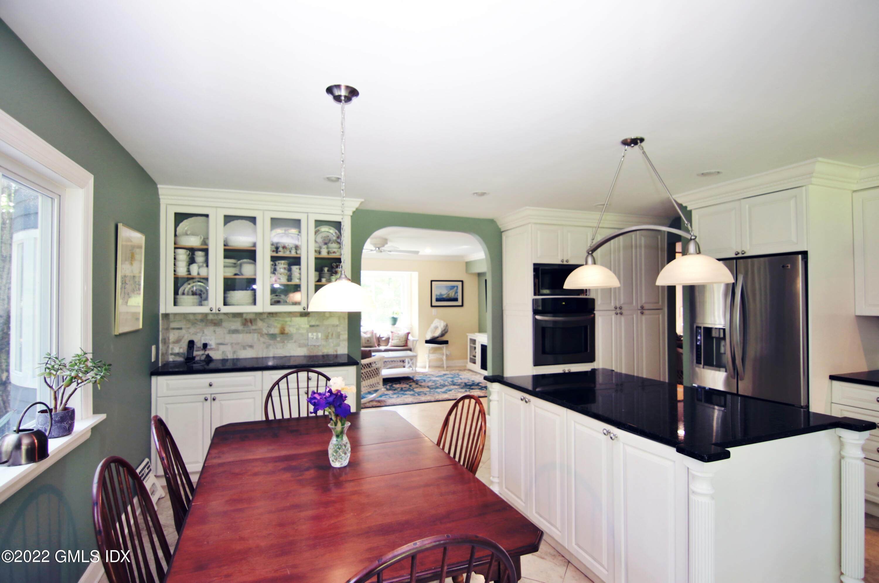 929 Riverbank Road Stamford, CT 06903 - Photo 16 of 42 Open views to Family rm